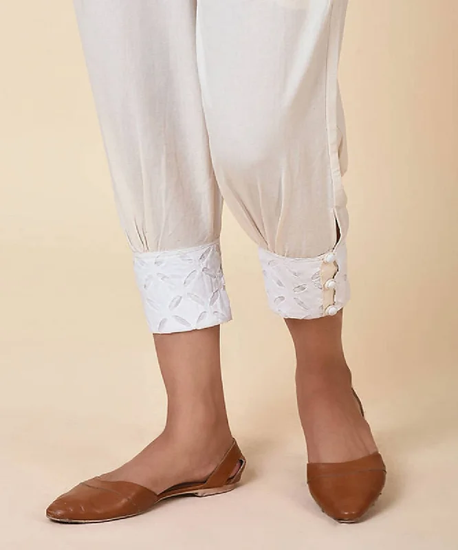 natural-white-handcrafted-kora-cotton-womens-cuff-pants-with-cutwork-embroidery